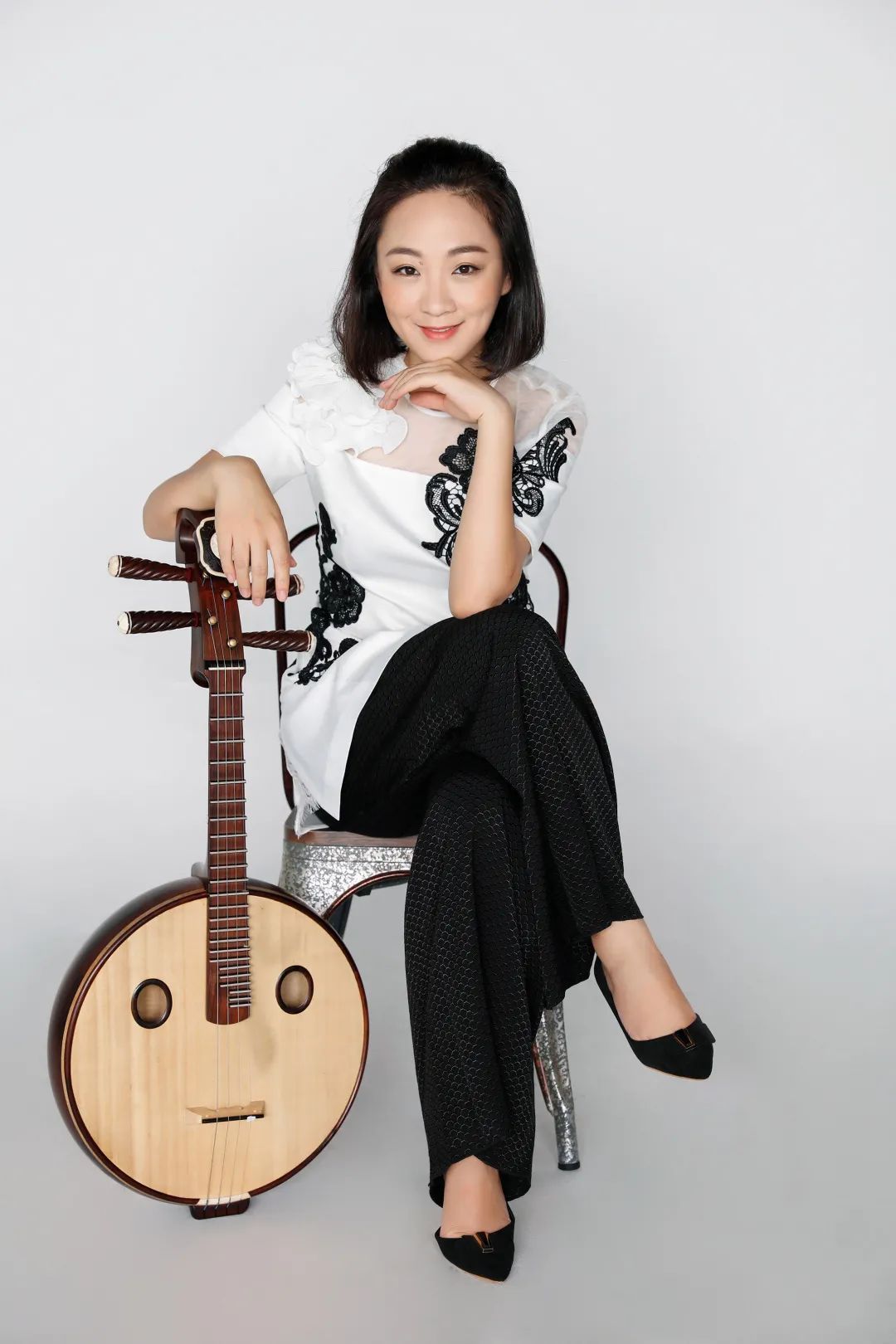 陶奕  上海馨忆民族室内乐团扬琴演奏员  中国