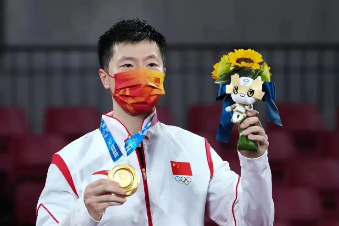 成为历史首位  蝉联奥运会乒乓球男单冠军的球员,  实现双圈大满贯