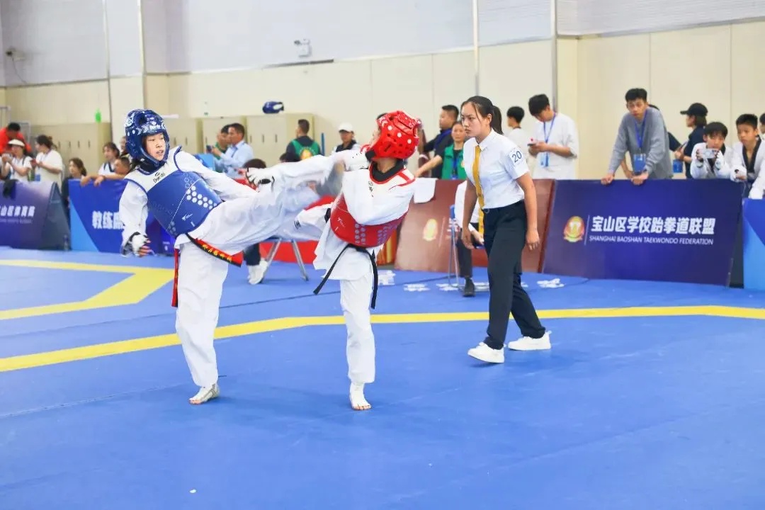 奖牌的背后,既凝结了区教育局的顶层规划和区学校跆拳道联盟的全力
